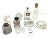 Antique bottles, ink bottles and glass magnifiers