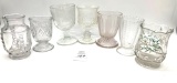Assortment of antique goblets and vases