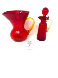 Vintage red and yellow blown glass pitcher and cruet