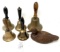 Antique brass bells with wood handles and wooden carved duck