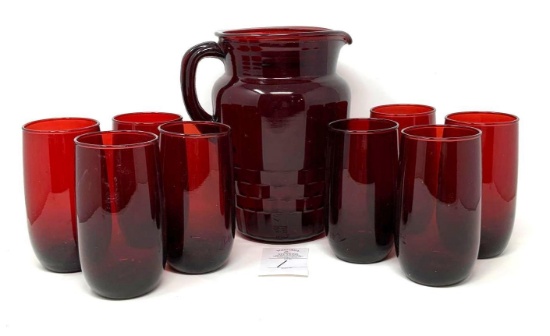 Vintage red pitcher and eight glasses