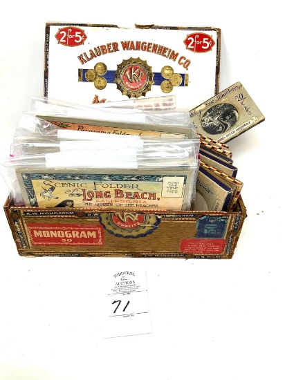 Antique postcards in cigar box