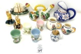 Antique assorted porcelain pitchers and figurines