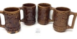 Four vintage brown pottery mugs