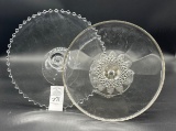 Two vintage clear glass pedestal cake stands