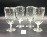 Four vintage etched glass goblets