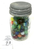 Antique jar of marbles