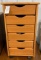 Wooden six drawer cabinet on wheels
