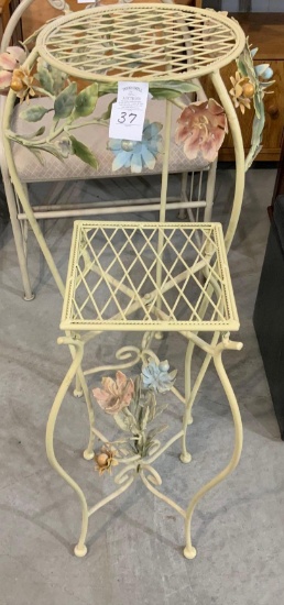 Two metal plant stands with pastel flowers