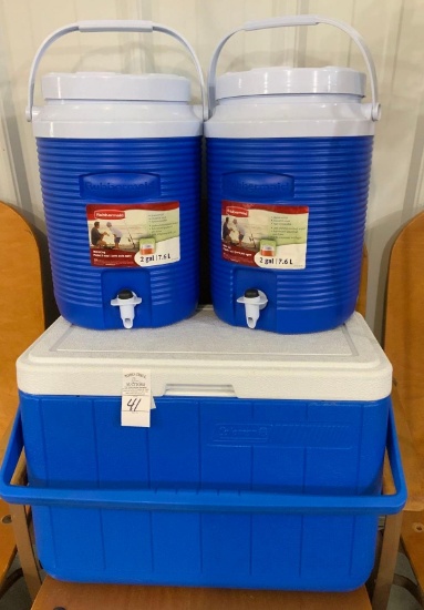 Three blue coolers
