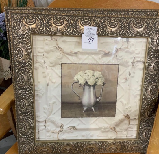 Two gold framed organic pictures