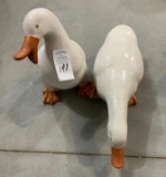 Two ceramic geese