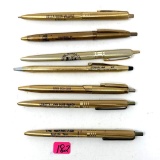 7 - VINTAGE GOLD COLORED ADVERTISING BALL POINT PENS