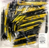 100 - YELLOW AND BLACK VINTAGE BALL POINT ADVERTISING PENS