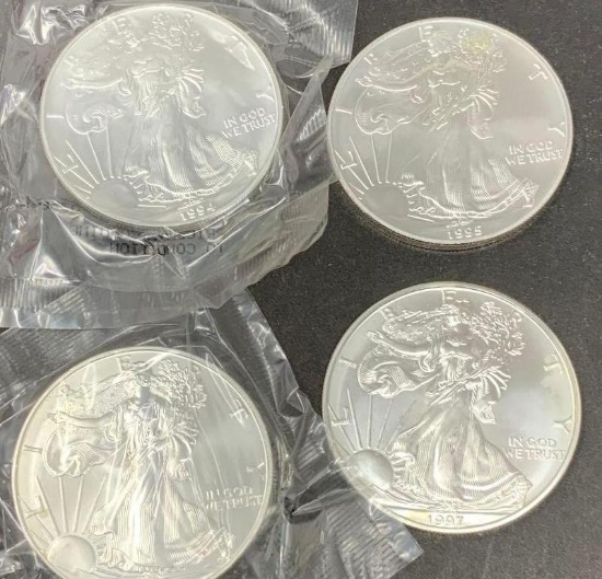 4 - AMERICAN SILVER EAGLES