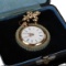 Yellow 14k gold lapel/ pendant watch with pearl on fleur de lis fob