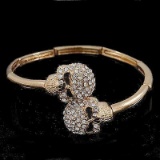 Double Skull' Flex Bangle Bracelet In Gold Plating