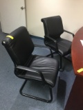 TWO BLACK CLIENT CHAIRS