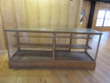 OAK AND GLASS DISPLAY CASE.