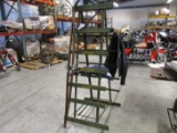 JOHN DEERE DISPLAY RACK, OLD SKIES, AMERICAN FLAG, NICE OLD LEATHER JACKET.