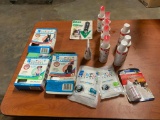 Pet First aid Supplies including bandages, hotspot spray, blood stopper, and ointment