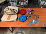 Variety of Dog Supplies including Dishes, Harrnesses, Leashes, and Car seat Cover