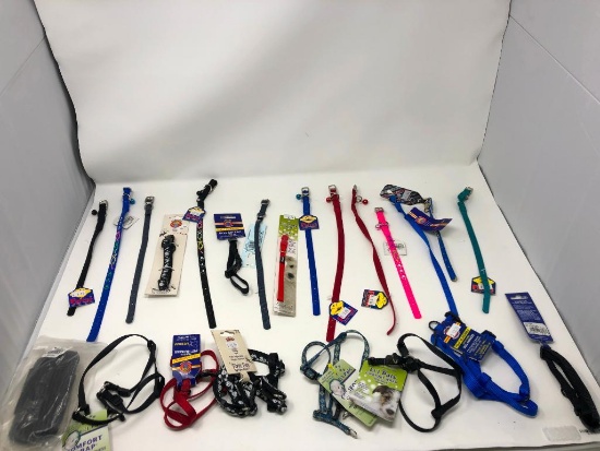 22, assorted leashes, collars, and harnesses