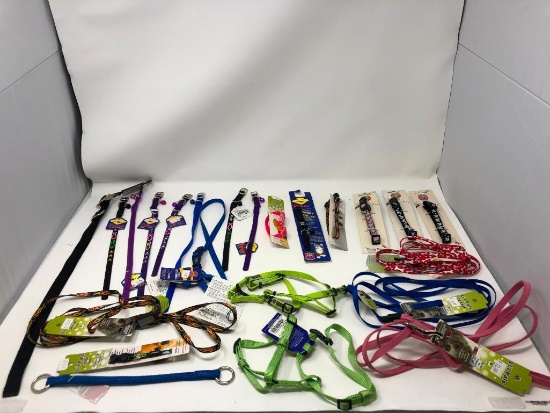 23, assorted leashes, collars, and harnesses