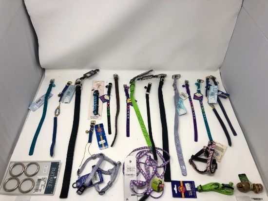 22, assorted leashes, collars, and harnesses, chew toy