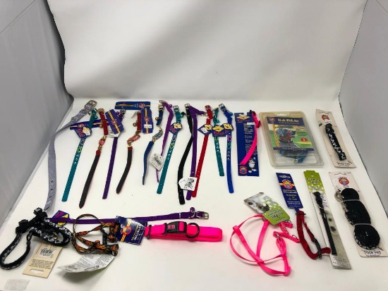 23, assorted leashes, collars, and harnesses