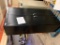Metal storage cabinet with contents