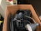 Box of desk accessories including lamps and organizers
