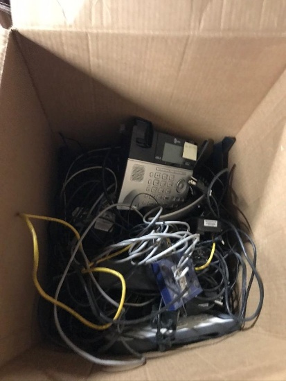 Box of wires, chords, phones, surge protectors
