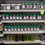 contents of 4' section: bulk herb containers & glass vases