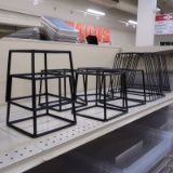 contents of top shelf: display riser stands & cutting board holders