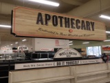 apothecary signage plus T-bar sign hangers in area