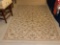 TIGHTLY WOVEN MACHINE MADE RUG W/ SCROLL