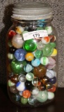 COLLECTION UNSORTED MARBLES IN BROCKWAY CLEAR