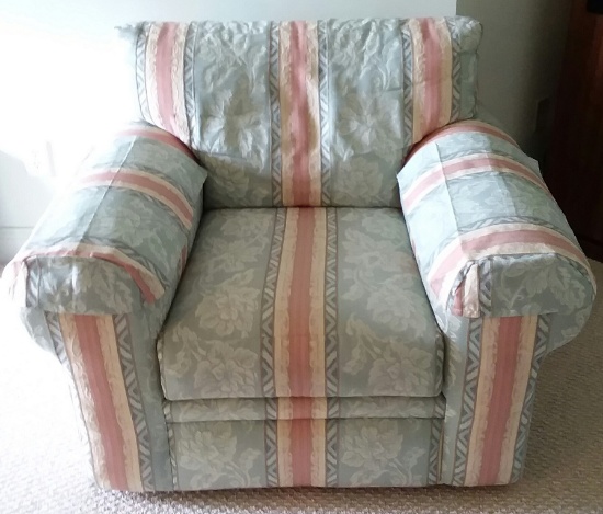 Blue Upholstered Chair with Flower Pattern