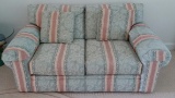 Blue Love Seat Couch with Flower Pattern