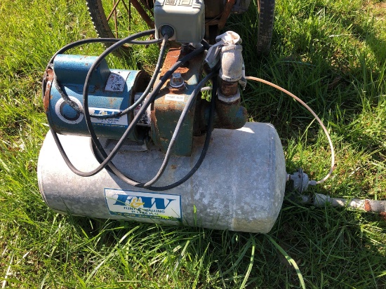 Water pump with pump electric motor and tank