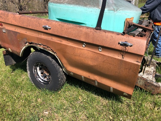 Truck bed trailer with poly tank