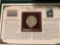 1921 Morgan silver dollar and stamps