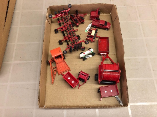 Box lot of 1/64 scale implements