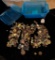CONTAINER OF METALIZED PLASTIC BUTTONS