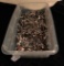CONTAINER OF LOOSE RIVETED SHANKS