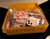CONTAINER OF VARIOUS BUTTONS
