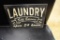 21 in. x15 in. newer Laundry metal sign