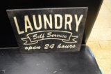 21 in. x15 in. newer Laundry metal sign