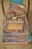 Variety of rustic cigar boxes in various forms of condition